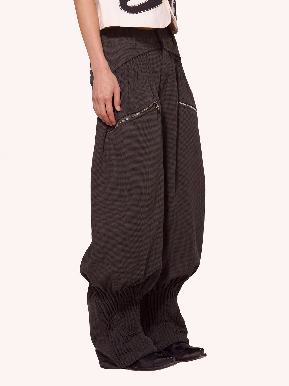 “NEXUS” PLEATED CARGO TROUSERS