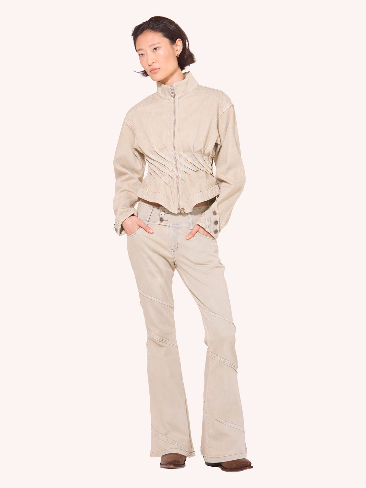 “PORTAL" PLEATED FLARED DENIM TROUSERS